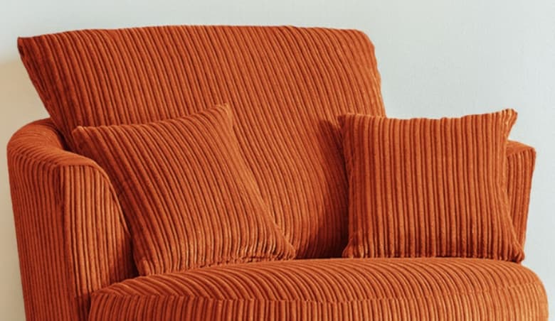 Luxor Orange Jumbo Cord Swivel Chair by Wilko